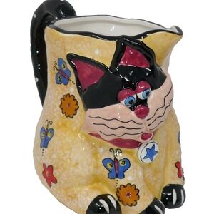 Colorful Cat Pitcher with Floral Design. *
